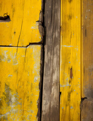 Texture of vintage wood boards with cracked parts yellow and brown