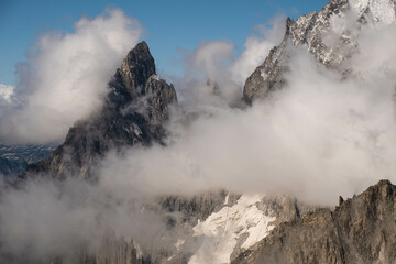 Fototapeta na wymiar the Mont Blanc mountain range seen from Punta hellbronner in July 2023 under the snow