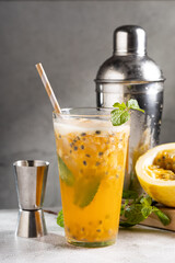 Refreshing passion fruit drink with mint and vodka.