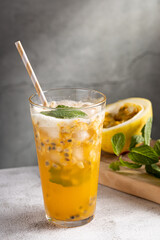 Refreshing passion fruit drink with mint and vodka.