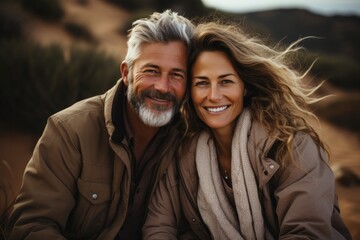 Perfect romantic couple smiling and relaxing while on vacation. stylish couple during sunset