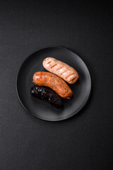 Delicious juicy sausages of several varieties grilled with salt, spices and herbs