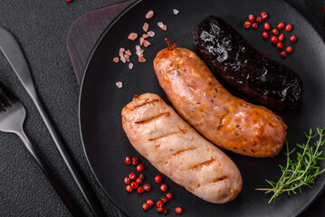 Delicious juicy sausages of several varieties grilled with salt, spices and herbs