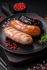 Delicious juicy sausages of several varieties grilled with salt, spices and herbs