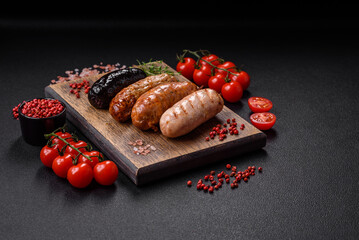 Delicious juicy sausages of several varieties grilled with salt, spices and herbs