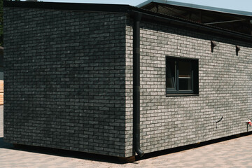 Newly built single storey prefabricated modular building. Prefabricated mobile wooden house on...