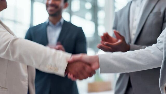 Shaking hands, applause and team of business people in partnership, deal or agreement in office. Handshake, clapping and group in collaboration, b2b integration or acquisition, success or celebration