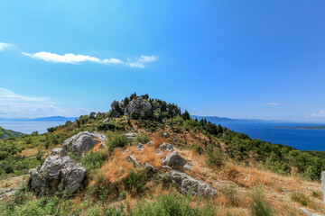 Fototapeta na wymiar The ruins of the Gradina fortress in the town of Drvenik