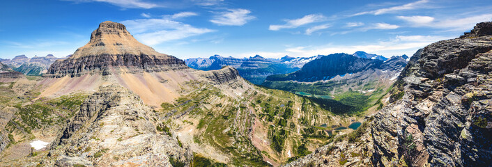 Panoramic view of Reynolds Mountain peak and Twin Lakes valley below Fusillade Mountain, in Glacier...