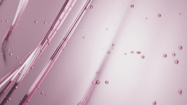 Pink gel flow texture. Rose serum toner or oil. Liquid gel moisturizer with bubbles macro. Clear cosmetic cream or face serum. Abstract background for cosmetics commercial product