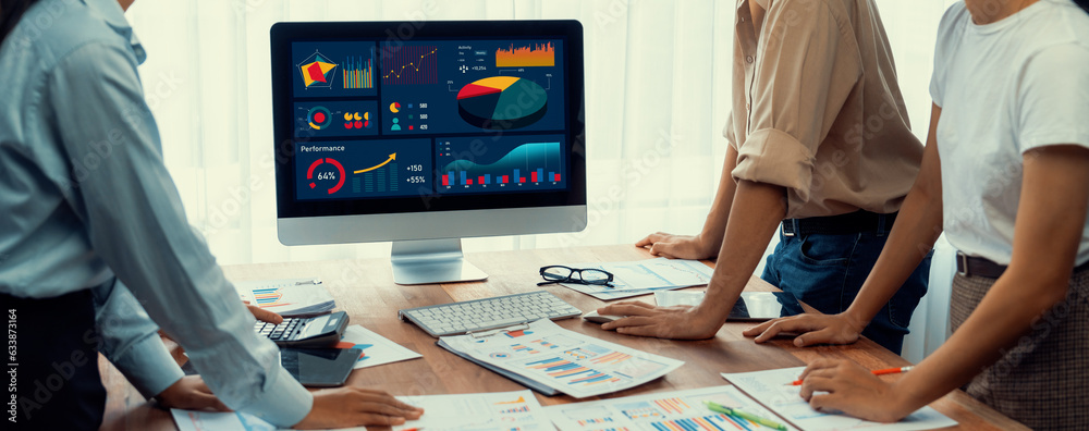 Aufkleber Panorama shot analyst team utilizing BI Fintech to analyze financial report with laptop. Businesspeople analyzing BI power dashboard displayed on laptop screen for business insight. Scrutinize
