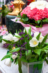 Decoration of the dining table for Valentine's Day. Bouquet of white tulip.