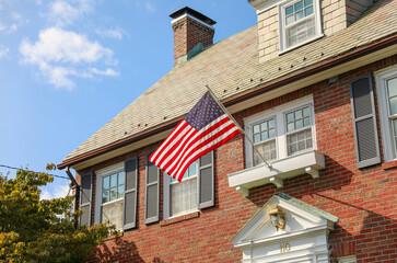 US flag waves proudly, embodying American patriotism and honor on this special holiday, symbolizing unity and freedom