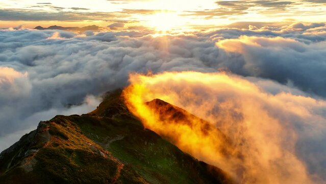 beautiful sunrise in the mountains, idyllic aerial landscape of Japanese Alps, hiking and tourism in Japan, idyllic tranquil morning in foggy mountains
