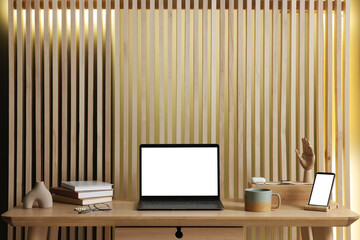 Stylish workplace with laptop and stationery on wooden table indoors