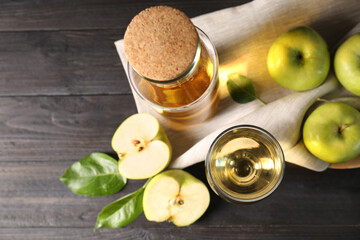 Flat lay composition with delicious apple cider on wooden table