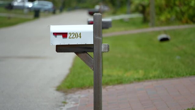 American mailbox at Florida home front yard on suburban street side