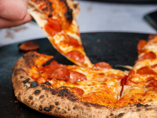 Crispy, Oven-Fresh Pizza Crust in Focus as Abstract Background for Italian Cuisine