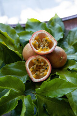 Sliced passion fruit Passiflora edulis from a tropical garden