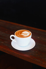 Delicious cappuccino for breakfast in a cafe. A stylish concept for advertising coffee and roasting beans