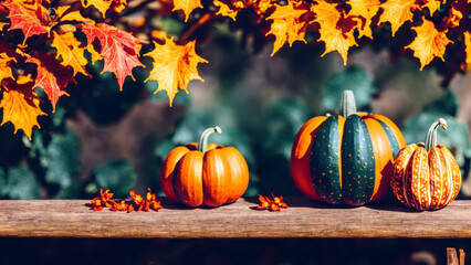 Naklejka na ściany i meble Colorful Pumpkins on Fence Rail with Autumn Leaves Holiday Halloween Thanksgiving Background Wallpaper