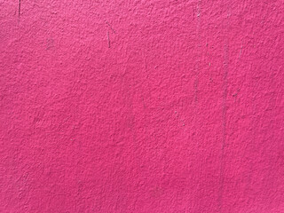Bright pink blank wall texture background in Oaxaca, Mexico.
