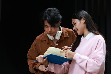 a couple of female students discussing a lesson after class