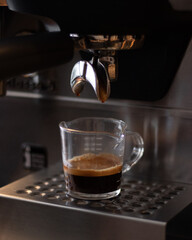 espresso machine pouring coffee