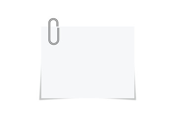 White note paper with glaring metallic clip isolated