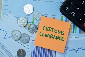 Concept of Customs Clearance write on book isolated on Wooden Table. - obrazy, fototapety, plakaty