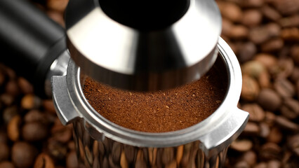 Coffee tamping. Preparation to making coffee in coffee machine