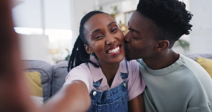 Black couple, selfie and face with picture for social media at home in living room with smile. Love, support and trust of happy young people together with a cute photo in a house relax on a couch