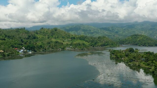Lake Sebu, South Cotabato, Philippines. Tropical Landscape with blue sky and clouds. Aerial drone view in Mindanao.