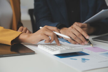 Financial Business team present. Business man hands hold documents with financial statistic stock photo, discussion, and analysis report data the charts and graphs. Finance Financial concept