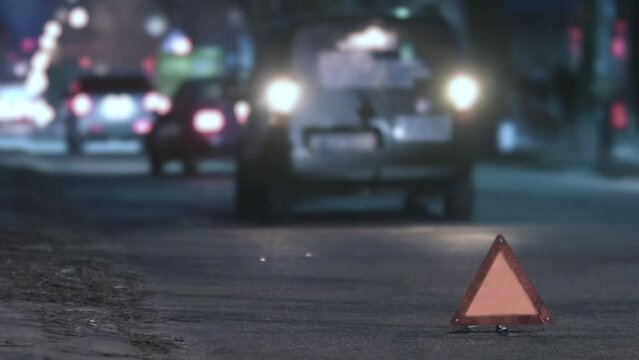 Car stops abruptly after accident, tense moment in urban chaos, a scene of unexpected pause.
