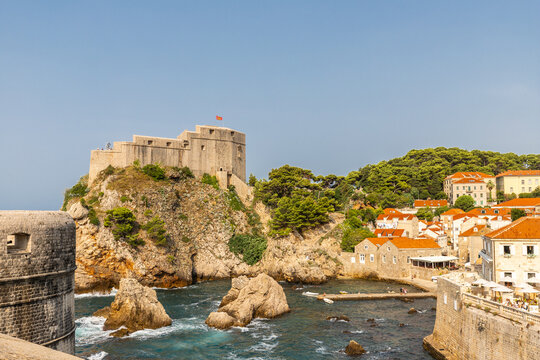 Dubrovnik, Croatia 07-29-2023 The UNCESO world heritage old town of Dubrovnik with fortified walls with spectacular views from the walls over the old town, the narrow streets and the Adriatic sea.