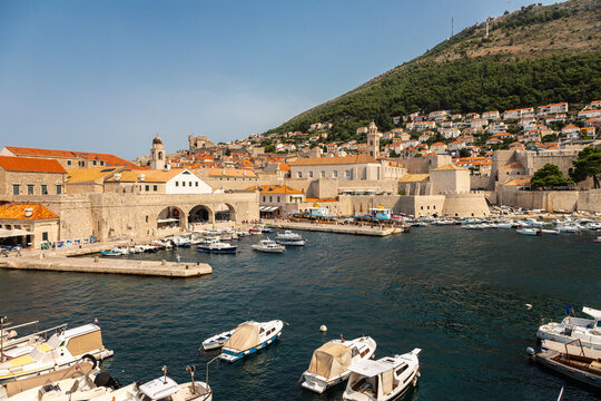 Dubrovnik, Croatia 07-29-2023 The UNCESO world heritage old town of Dubrovnik with fortified walls with spectacular views from the walls over the old town, the narrow streets and the Adriatic sea.