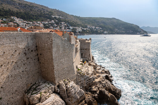 Dubrovnik, Croatia 07-29-2023 The UNCESO world heritage old town of Dubrovnik with fortified walls with spectacular views from the walls over the old town, the narrow streets and the Adriatic sea.