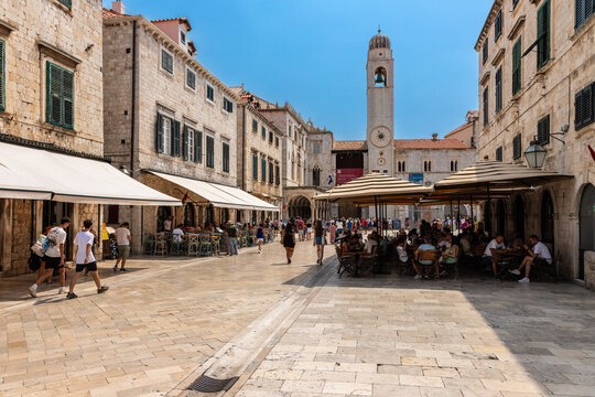 Dubrovnik, Croatia 07-29-2023 The UNCESO world heritage old town of Dubrovnik with fortified walls with spectacular views from the walls over the old town, the narrow streets and the Adriatic sea.