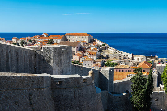 Dubrovnik, Croatia 07-29-2023 The UNCESO world heritage old town of Dubrovnik with spectacular views from the fortified walls over the old town with red roof tops, narrow streets and the Adriatic sea.