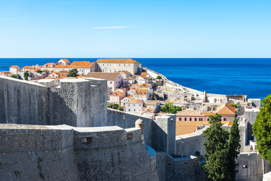 Dubrovnik, Croatia 07-29-2023 The UNCESO world heritage old town of Dubrovnik with spectacular views from the fortified walls over the old town with red roof tops, narrow streets and the Adriatic sea.