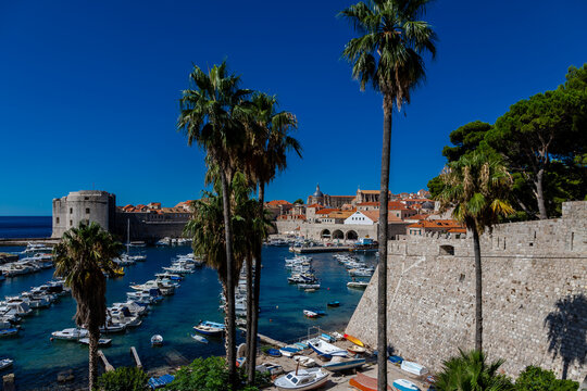 Dubrovnik, Croatia 07-29-2023 The UNCESO world heritage old town of Dubrovnik with spectacular views from the fortified walls over the old town with red roof tops, narrow streets and the Adriatic sea.