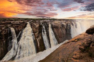 Augrabies water fall, raging water and full color sunsets