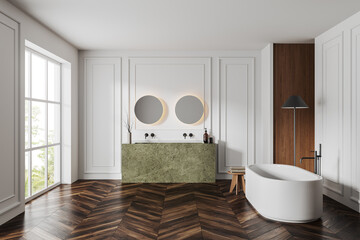 Classical bathroom interior with bathtub, double sink and panoramic window