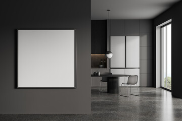 Gray kitchen interior with fridge and poster