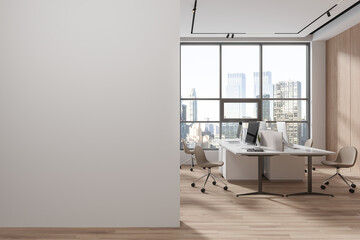 White and wooden open space office interior with blank wall