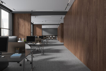 Fototapeta na wymiar Gray and wooden open space office interior with partitions