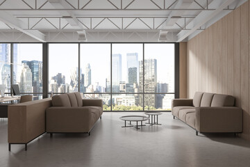 Business office interior lounge zone with coffee table near panoramic window