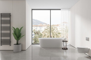 Fototapeta na wymiar Stylish hotel bathroom interior with tub and toilet, panoramic window