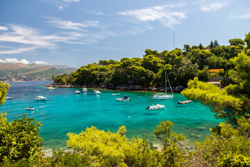 A beautiful bay at the Dalmatian Coastal line close to Dubrovnik with crystal clear and turquoise waters, creating a feeling of paradise
